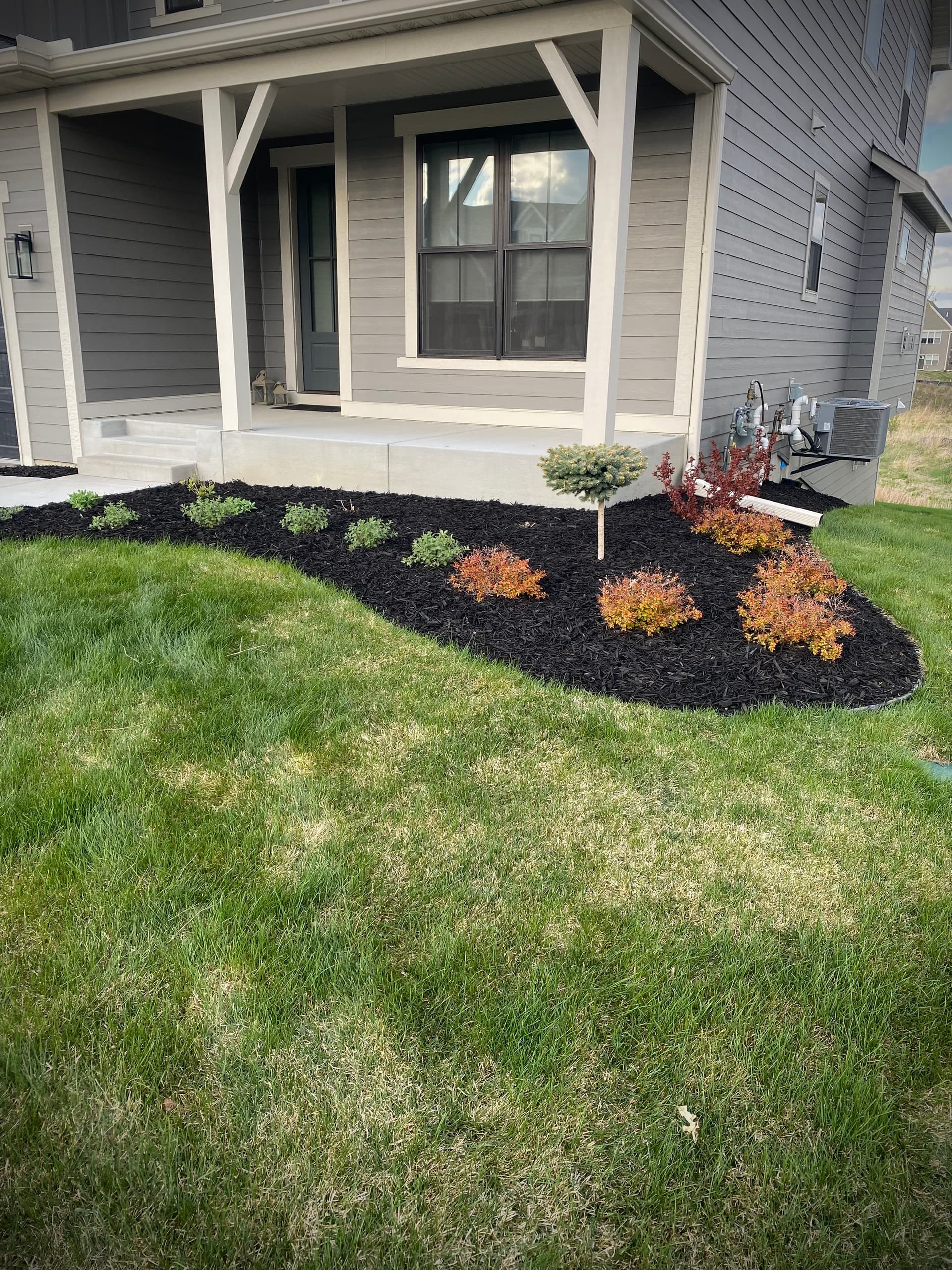 Gallery photos for Fresh Mulch Refresh That Gave This Maple Grove Home Instant Curb Appeal: Image #1