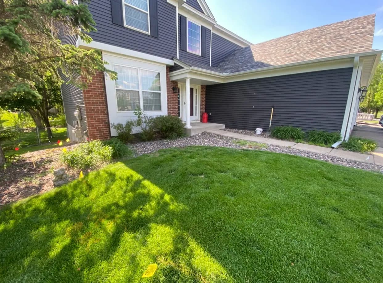 Otsego Front Yard Gets New River Rock, Plants, and a Smarter Layout image