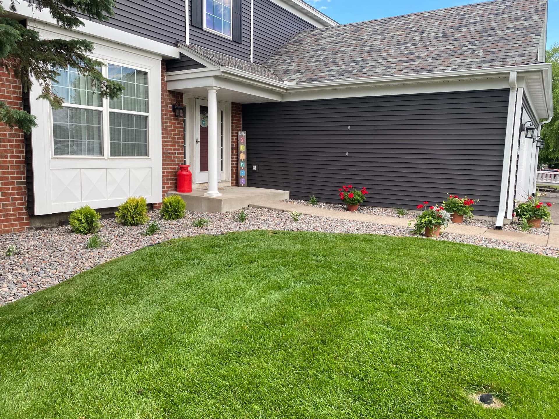 Gallery photos for Otsego Front Yard Gets New River Rock, Plants, and a Smarter Layout: Image #1