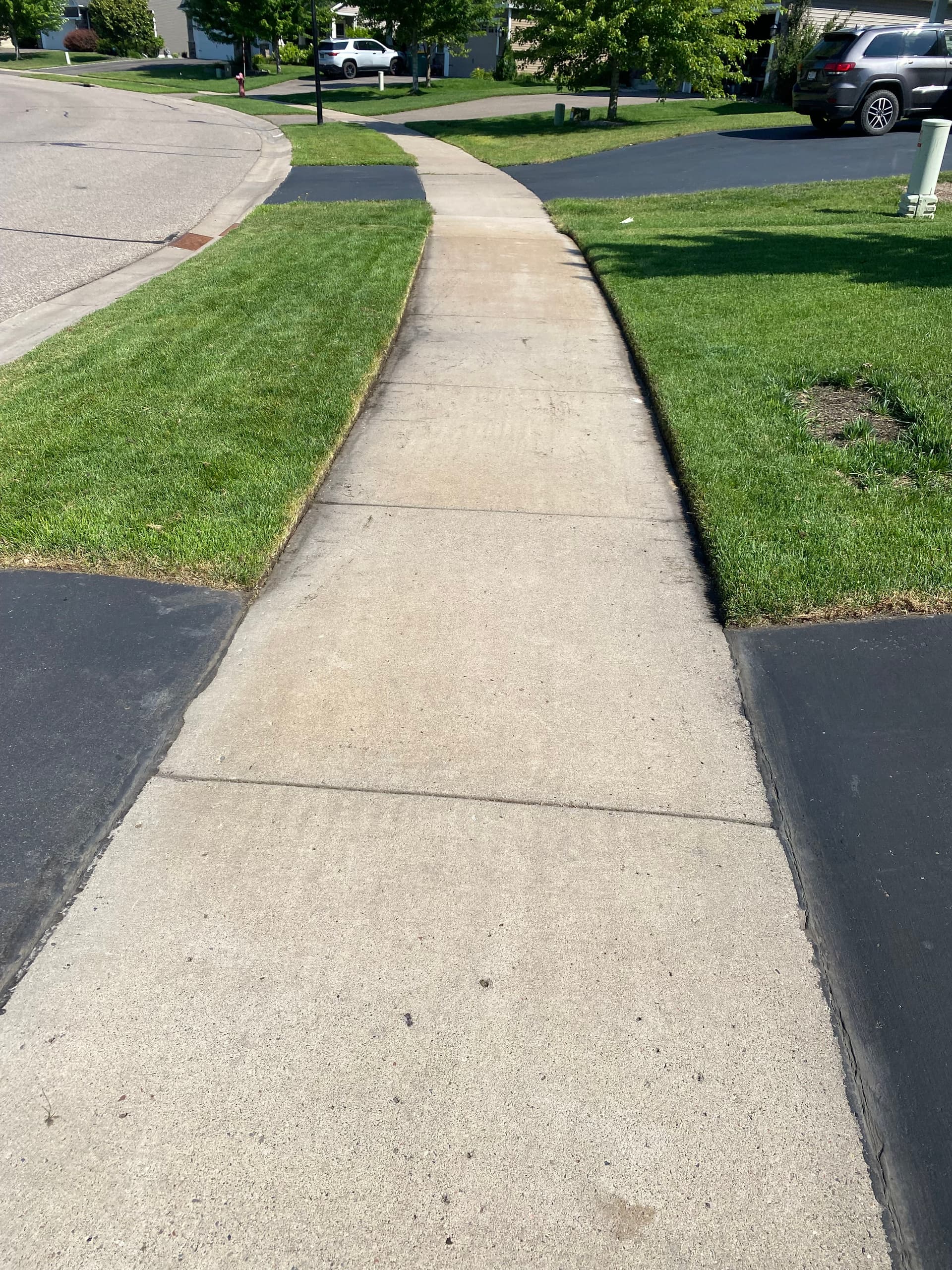 Gallery photos for Clean Sidewalk Edging That Sharpens Your Whole Yard in Otsego: Image #1